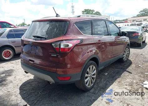 2018 Ford Escape Titanium z USA, uszkodzony, nr VIN 1FMCU0J97JUA48843